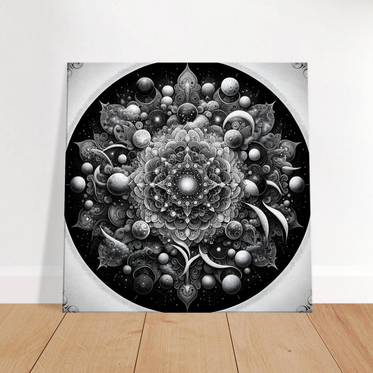 Grayscale mandala artwork featuring stars, moons, and cosmic swirls in intricate symmetry, blending celestial themes with elegant design.
