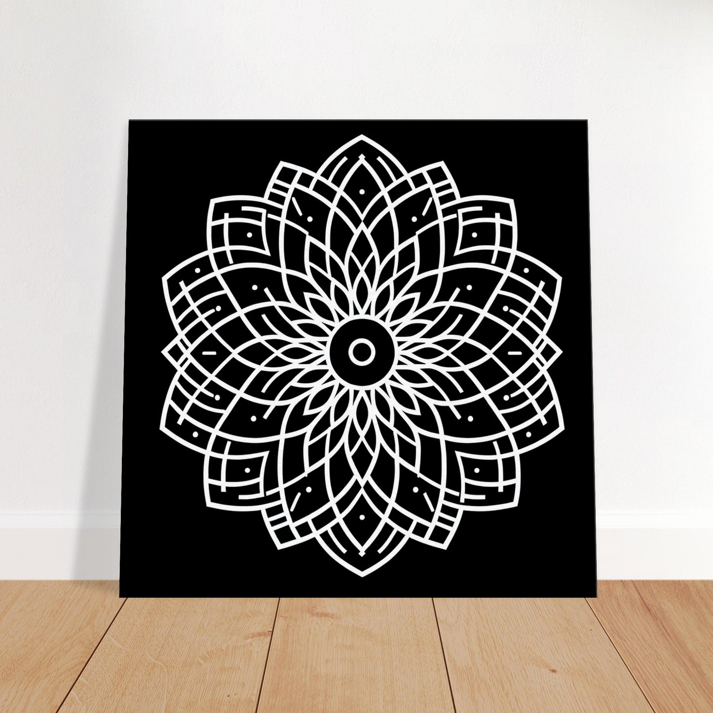 Black and white mandala artwork with bold, minimal lines and geometric symmetry, embodying clarity and modern simplicity.
