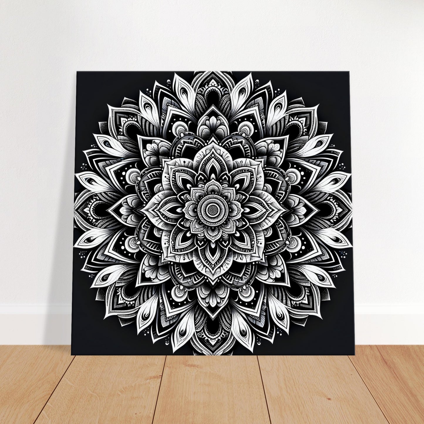 Mandala artwork in black, white, and grayscale with detailed symmetrical patterns and bold contrast for a minimalist aesthetic.