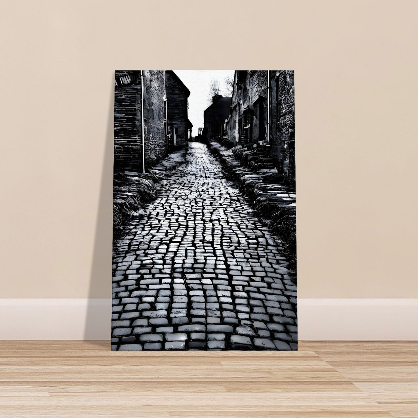 Black and white canvas of an old cobbled street lined with aged buildings and deep shadows