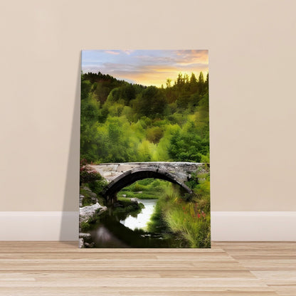 Stone arched bridge over a calm river with sunset light and lush green countryside hills in the background.