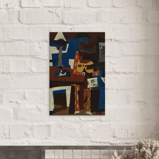 Canvas art reproduction of Pablo Picasso’s Three Musicians, featuring vibrant cubist shapes and colors depicting three stylized figures in abstract harmony.