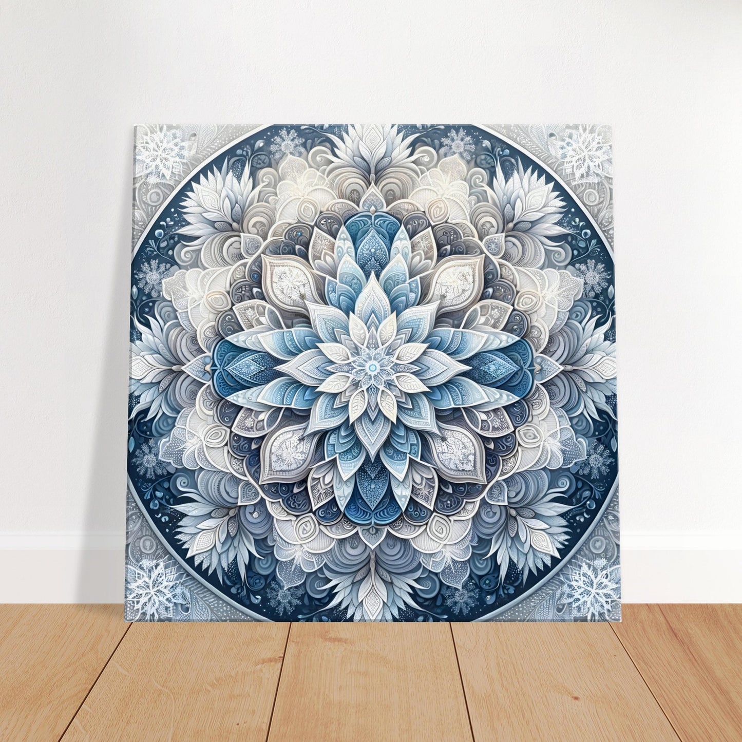 Mandala artwork featuring icy blue, silver, and frosty white on a cool gray background, capturing the serene essence of winter.